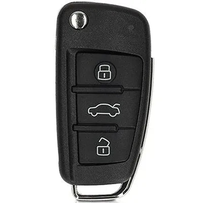 Audi three-button flip key with a round blade-release button, stacked lock, boot and unlock buttons and a lower metal loop